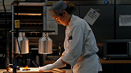 A baking student in a lab